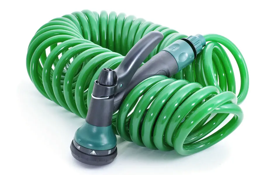 a coiled green hose