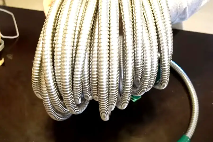 a coiled metal hose