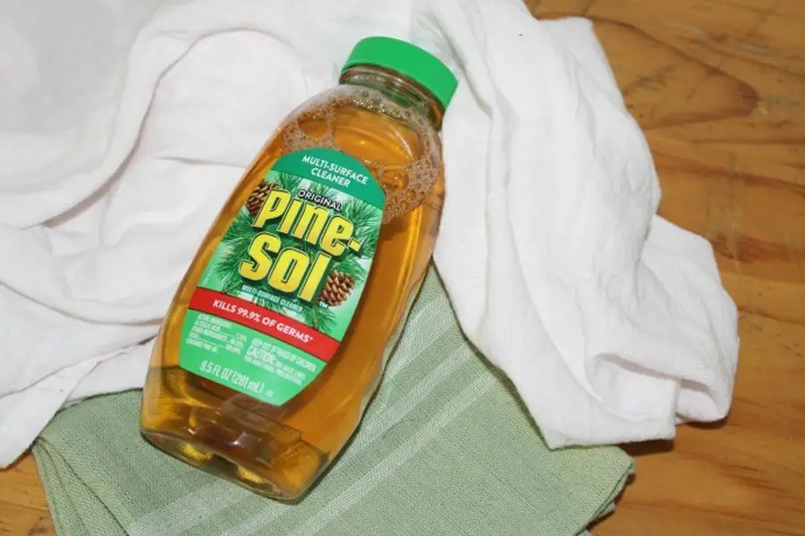 a bottle of pine sol on a table counter