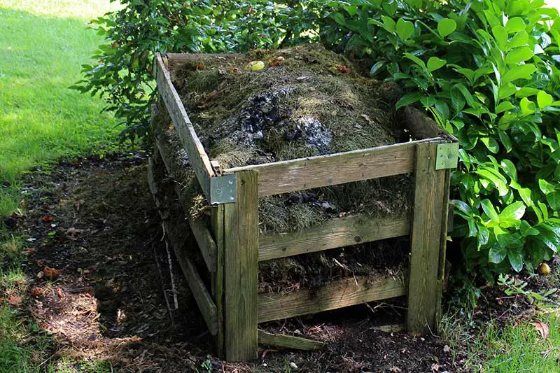 a wooden compost bin